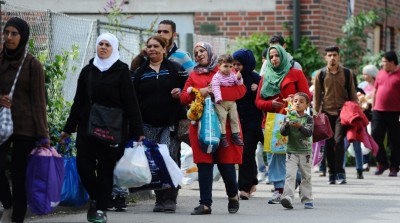 މިއަހަރު ޖަރުމަނަށް ހިޖްރަކުރި ރެފިއުޖީންގެ އަދަދު އަށް ލައްކައަށްވުރެ މައްޗަށް ގޮސްފި