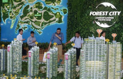 މެލޭޝިއާގައި އަލަށް ހަދާ ސިޓީން ބޭރު މީހުން ބިން ގަތުން މަނާކޮށްފި