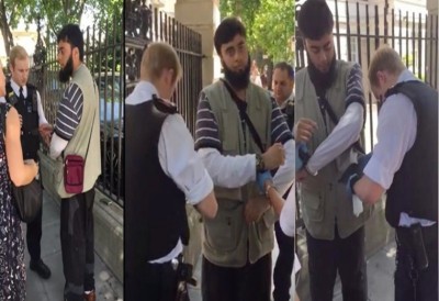 މާގިނަ ހެދުން ލައިގެން ހުރުމުގެ ސަބަބުން ހުކުރަށް ދިޔަ މުސްލިމެއް އިނގިރޭސިވިލާތުގައި ހުއްޓުވައިފި