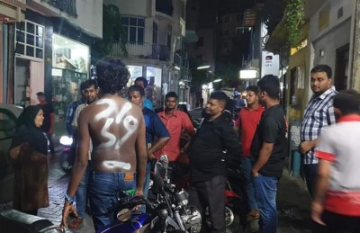 މާލޭގެ ފިހާރައަކުން ފެން ކޭހެއް ވަގަށް ނެގި މީހަކު ގަން ހިންގުވައިފި