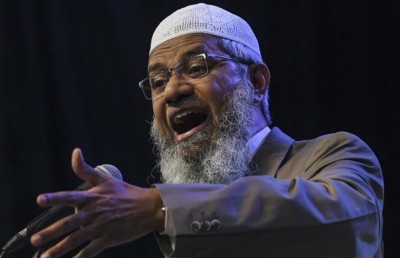 ޒާކިރު ނައިކްއާ މެލޭޝިއާ ފުލުހުން ސުވާލުކުރަނީ