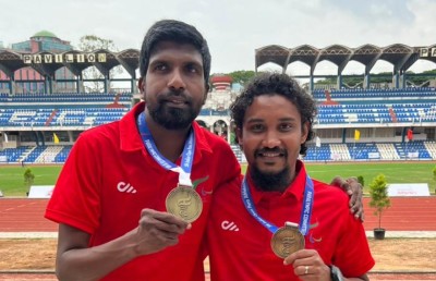 މާޒިން، ޕެރަލިމްޕިކްގެ ފުރަތަމަ ރަން މެޑަލް އެތުލީޓް