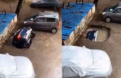 ޕާކްކޮށްފައި އޮތް ކާރެއް އެ ދިޔައީ ބިމު އަޑިއަށް