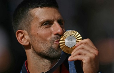 އޮލިމްޕިކްސްއިން ރަން މެޑަލް ހޯދައި ޖޮކޮވިޗް ގޯލްޑަން ސްލޭމް ފުރިހަމަ ކޮށްފި