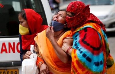 އިންޑިއާގައި ކޮވިޑްގެ ކޮންމެ މަރަކަށް 674 ޑޮލަރުގެ ބަދަލެއް