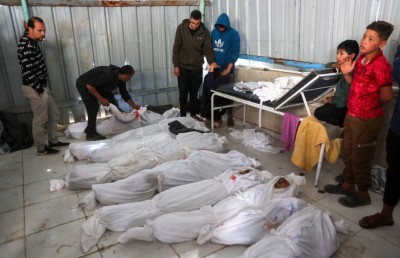 ޣައްޒާގައި އދ.ގެ އިމާރާތަކަށް ހަމަލާދީ ނުވަ ކުދިންނާ އެކު 19 މީހަކު ޝަހީދު