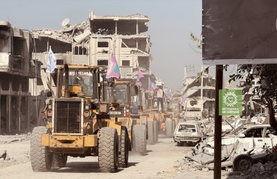 ޣައްޒާގެ ބިމާ ހަމަވެފައިވާ އިމާރާތްތައް ނަގައި ސާފުކުރުމުގައި އައިއޭސީ ބައިވެރިވަނީ