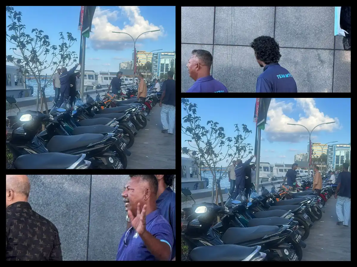 އެމްޑީޕީ އިން ބޮޑުތަކުރުފާނު މަގު، އެމްއެމްއޭ އާއި ދިމާ ބަނދަރުމަތީ ގައި ބަހައްޓާފައި ހުރި ކެމްޕެއިން ބެނާތަކެއް، އެމްޓީސީސީގެ ޔުނިފޯރމްގައި ތިބި މުވައްޒަފުންތަކެއް ނަގަނީ