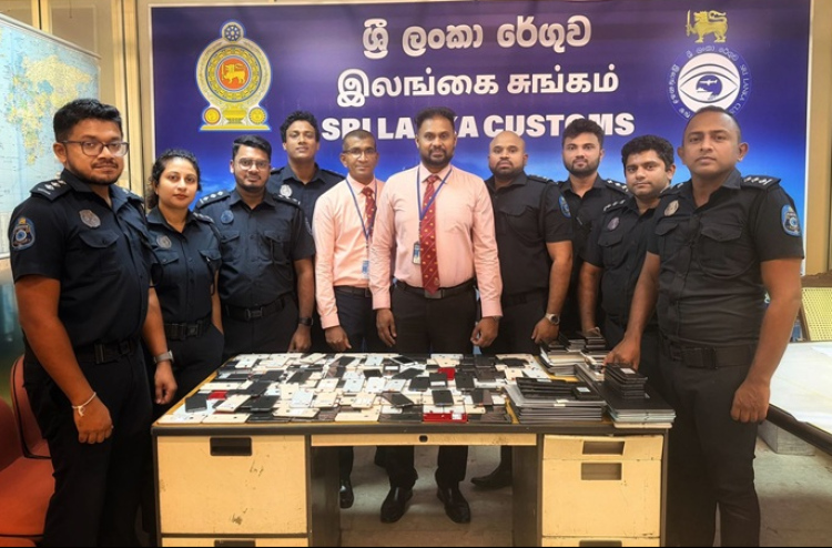 ސްކޭމް ހިންގަން ބޭނުންކުރާ ސާމާނު އެތެރެކުރަނިކޮށް ލަންކާއިން ޗައިނާގެ ނުވަ މީހަކު ހައްޔަރުކޮށްފި